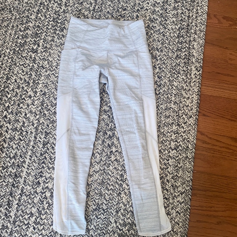 Athleta- cropped leggings- mesh material on legs- size XS